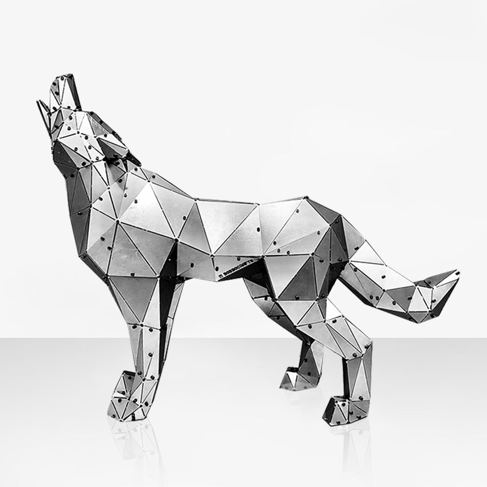 Handcrafted geometric metal wolf sculpture in a low-poly style on a white background