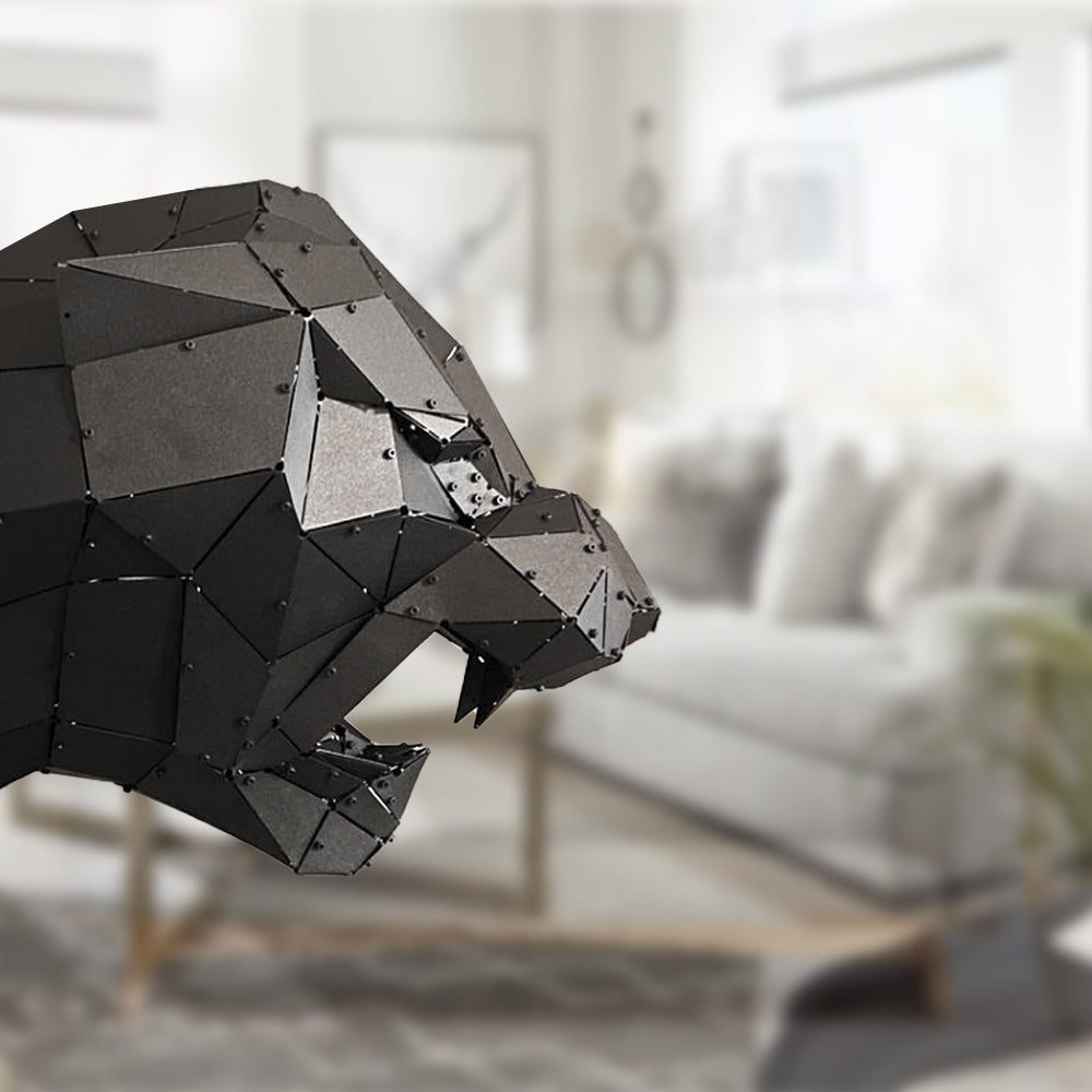 Low-poly handcrafted black metal panther sculpture in a modern living room setting