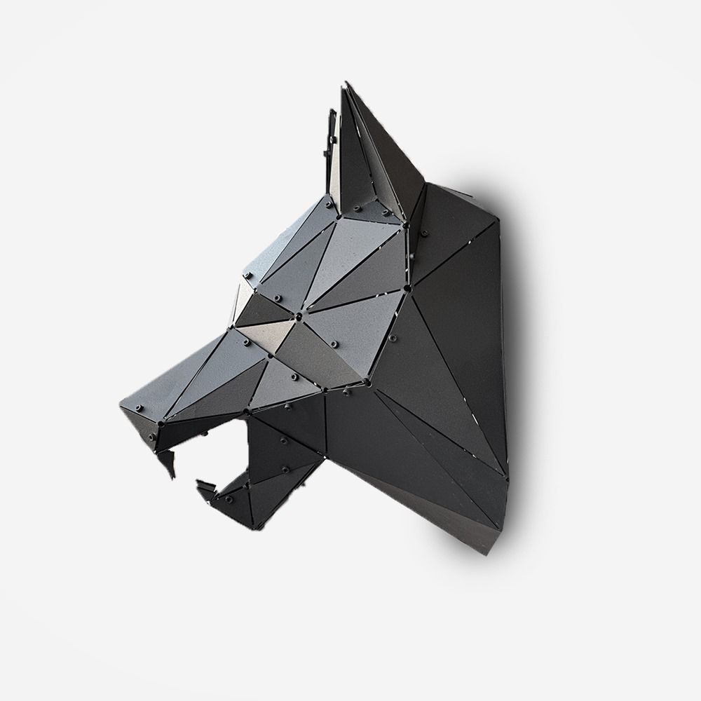 Low-poly handcrafted black metal wolf head sculpture on a white background