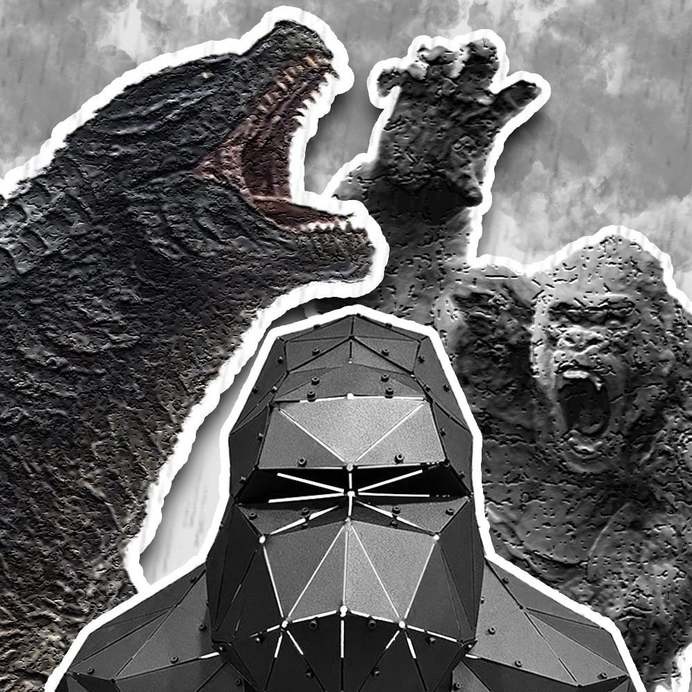 Low-poly black metal gorilla bust sculpture in front of a gorilla and giant monster artwork