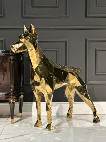 Luxury handcrafted gold metal geometric dog sculpture in a modern interior.