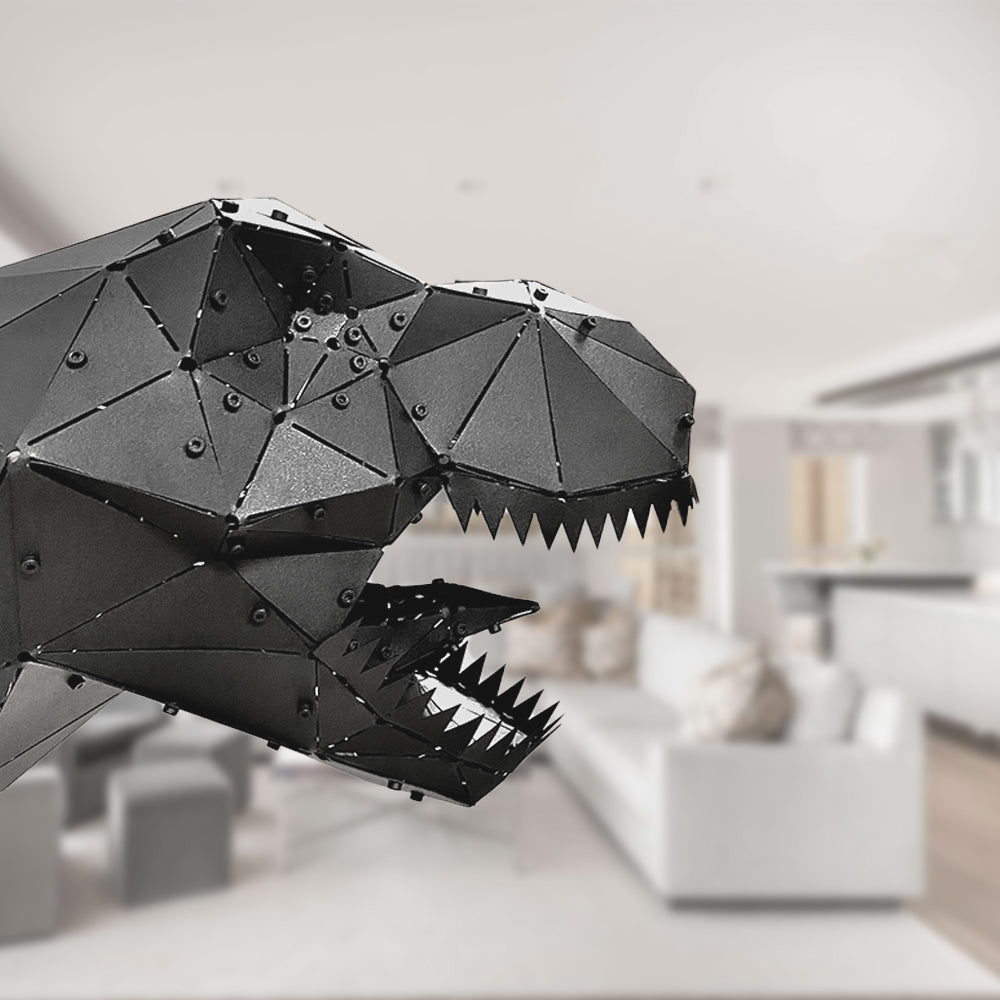 Close-up of a luxury handcrafted low-poly black metal T-Rex sculpture head.