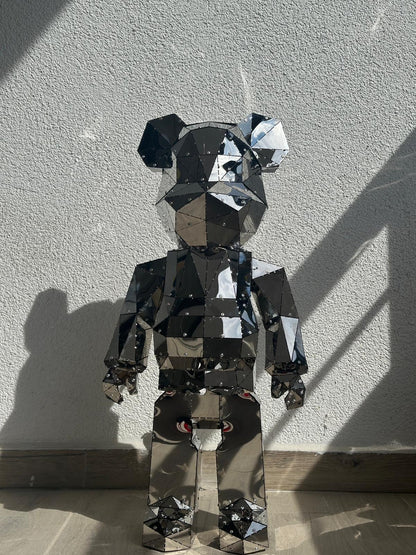 Luxury handcrafted mirrored stainless steel bear sculpture with a faceted geometric design.