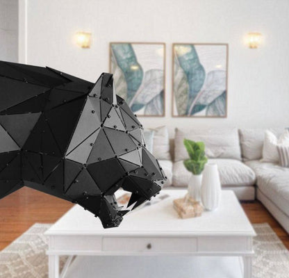 Modern black geometric metal tiger head sculpture in a luxury living room