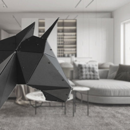 Modern low-poly black metal sculpture of a horse head in a luxury living room interior.