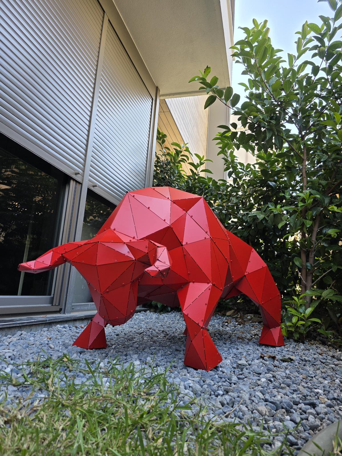 Red geometric 3D Bull v3 metal sculpture for outdoor garden decor by Metart Atelier